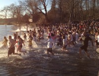 Jumpers running into the water.