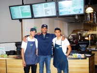 Energy Kitchen owner Steven Prashad flanked by manager John Berrios (right) and David Eugenio (left).