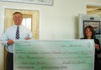 Richard and Donna D'Andrea present The Greater Mahopac-Carmel Chamber of Commerce a check.