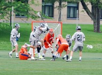 Hackley middie Leo Barse sets up a shot against Fieldston Wednesday in the NYSAIS Boys Lacrosse Championship at Manhattanville College. The Hornets won 15-5 to claim the state title.