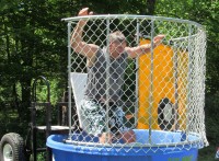 Yorktown Supervisor Michael Grace took a turn in the dunk booth at Yorktown Community Day.