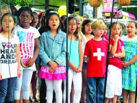Members of the Claremont School’s third-grade chorus performed Katy Perry’s “Firework” at the Ossining Village Street Fair Saturday.
