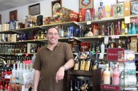 IMG_4398 lewis Stern, owner of Yorktown Wines & liquors offers tradition wines and liquors as well as the new infused flavors.