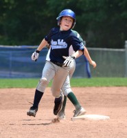 Putnam Valley's Brian Lieberman round second en route to inside-the-park homer in D-33 Little League win over Brewster.