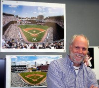 Paul Plaine of Ballpark Prints in his studio at 31 Mamaroneck Avenue, White Plains, with his before and after photos of New York’s Yankee Stadium.