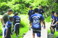 Partipants of the Peekskill Police Youth Academy try their hands at the BOCES Challenge Course.