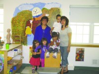 Lisa Montalto-Rodrigues (left) and Vera Iaconis pose with some of the children at Once Upon A Time preschool in Putnam Valley.