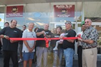 Rob Del Balzo was surrounded by friends, family and elected officials during the ribbon-cutting ceremony of Nuttin To It! Express Cuisine and Catering in Yorktown.