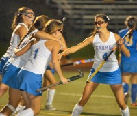 10-16 Carmel players celebrate the first of Jamie Manecky's two goals in Rams' 2-1 win over Mahopac last Wednesday. | The Examiner News