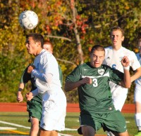 10-16 Mahopac's Raymond Arcieri and Brewster's Chris Blank get after 50-50 head ball won by Mahopac in 3-1 Indian win last Thursday. | The Examiner News