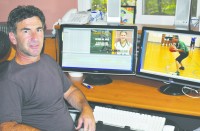 Scott Irwin in his home office of Athleteography in Somers.