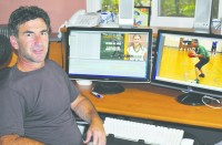 2012 NWE 1009 Athleteography Photo Scott Irwin in his home office of Athleteography in Somers.