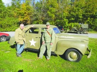 Bob Jacobs, left and George Bateman with his 1941 Plymouth  Army staff car .