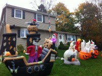 Daniel Donnelly’s Halloween lawn relies on multiple inflatable figures that all but obscure his house.