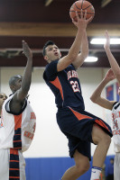 Briarcliff's Jared Jones sails to the basket in Friday's win by the Bears over Greeley. Photo by Andy Jacobs