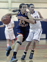 1-29ghoop3-Sam Srinivasan | The Examiner News Greeley's Sam Srinivasan drives to the basket in Friday'sgame at Briarcliff High School. Photo by andy Jacobs