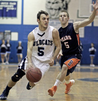 Westlake's Richie Maio drives past Briarcliff's Ryan Huegel in Friday afternoon's game. Photo by Andy Jacobs