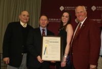 Westchester County Executive Robert Astorino (second left) presented a Proclamation to former Fordham Athletic Director Frank McLaughlin (right), a Braircliff resident and Certificates of Merit to Eastchester native Michael Debany (left) and Michelle Maguire Kennedy from Tarrytown, on their induction into the Fordham University Athletic Hall of Fame. Photo by Albert Coqueran