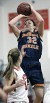 Greeley's Jackie Brett shoots the ball in
last Thursday's win at Rye. Photo by Andy Jacobs