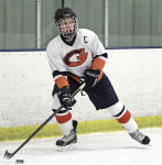 Greeley's Nicholas Girardi controls the puck in last
Thursday's 7-2 victory over Pawling. Photo by andy Jacobs