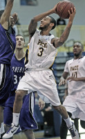 Ahmad George of Pace takes the ball to the basket in Saturday's home game vs. Stonehill. Photo by Andy Jacobs 