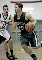 Charlie Montgomery of Pleasantville drives to the basketin last Wednesday's game at Putnam Valley.. Photo by Andy Jacobs