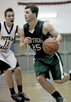 2-5Pville2-Charlie Montgomery | The Examiner News Charlie Montgomery of Pleasantville drives to the basketin last Wednesday's game at Putnam Valley.. Photo by Andy Jacobs