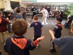 Local scouts learn how to sword fight from "Peter Pan" cast members.