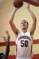 Somers' junior C Max Parks and the eighth-seeded Tuskers advanced to the quarterfinals of the Section 1 Class A tournament for the first times since 1995 after eliminating visiting No.9 Gorton, 62-46, last Friday. Photo by Ray Gallagher