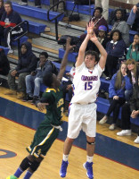 Sports Page 14 Photo-1 | The Examiner News James Decker had eight rebounds in the loss to St. Peter's. Photo by Billy Becerra