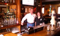 Patrick Stewart and his daughter Amelia by the bar of Annie Molloy’s Irish Castle.