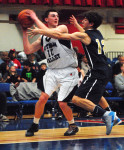 Tiger G Zach Coleman found the paint tough to penetrate against Lourdes last Wednesday.
RAY GALLAGHER PHOTOS