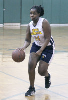 Gaelle Desroches dribbles up court. Billy Becerra Photo