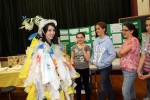 Students from the Pleasantville High School Environmental Club model this dress made from discarded plastic bags at the annual Earth Day Green Fair at Pleasantville Middle School on April 11.