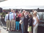 Local officials and members of Bedford 2020 at Sunday's car show at Grand Prix New York in Mount Kisco that featured the latest in fuel-efficient cars.