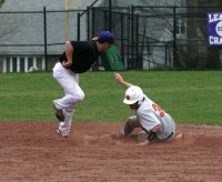 Frame 2 | The Examiner News Huguenots shortstop John Valente (left) thinks he made the tag and bring his glove up as Adams hook-slides into second base on the steal attempt in the sixth inning. Photo by Albert Coqueran
