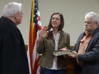 Trustee Stephanie Hawkins is sworn in by Cold Spring Village Justice Thomas Costello