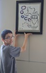 Seventh-grader Eli Wald saw his art exhibit open on Friday at the Mount Kisco Public Library.