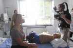 Tamara Rabil, left, actress Angela Pierce and director Andrew Young on the set of "Unburden."