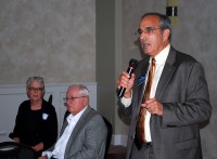 Victor Grossman (right), a candidate for the New York State Supreme Court, addresses the Putnam Democratic Committee as Democratic Chair Cathy Croft and Elections Commissioner Robert Bennett look on.