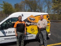 Pop-A-Lock co-owner Richie Harold, right, with locksmith John Morales