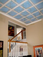 301 Home Guru pic | The Examiner News The ceiling of Carole Bonicelli’s great room is painted to give the effect of being in a greenhouse.