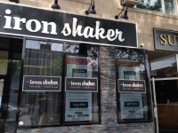 The paper in the windows at The Iron Shaker may be removed this week. The view inside is sleek, sophisticated and intimate.