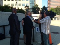 Kenneth Chamberlain, Jr. looks on while Attorney Randolph McLaughlin speaks with local media at the Federal Courthouse in White Plains. Pat Casey Photo