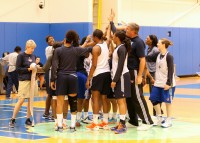 Bill Laimbeer (third right) the newly hired General Manager and Head Coach of the New York Liberty ends a practice session with an expression of team unity, at the MSG Training Center in Greenburgh. Photo by Albert Coqueran 