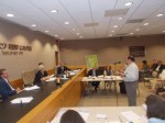 The New Castle Town Board listens to mostly critical comments leveled against the proposed retail plan at Chappaqua Crossing during a public hearing Tuesday night.