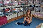 Julia Desmarais in the Blythedale Children's Hospital closet she cleaned and organized for her Girl Scout Gold Award.
