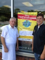 Richard Lange, owner of Lange's Deli in Chappaqua and New Castle Town Board member John Buckley promote the Wounded Warriors Golf Outing, scheduled for Aug. 12.