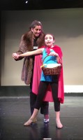 Red and Wolf share a moment during Into the Woods Jr. Allison Jasne Photo