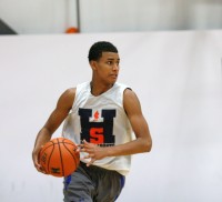 Jordan Tucker drives to the hoop while playing for White Plains High School, in the House of Sports Basketball Summer Basketball League. Tucker is a 15 year-old freshman, who measures six feet and six inches tall and is expected to play varsity on the Tigers next season.  Photo by Albert Coqueran